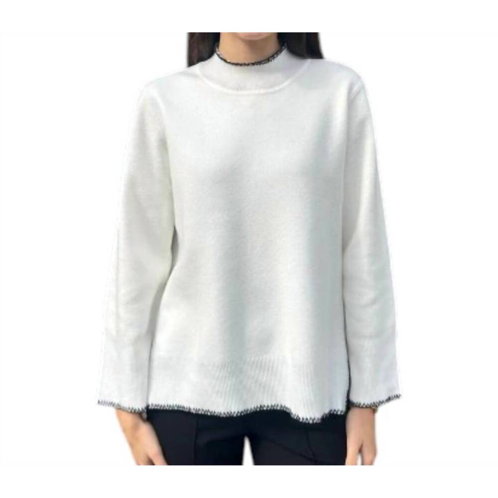 NEW ATELIER high-low mock neck sweater with stitched trim in snow and black